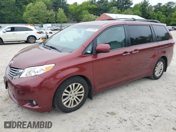2015 Toyota Sienna XLE with VIN 5TDYK3DC1FS648469, listed as a Copart auction lot 57471975 with 118,567 mi miles and Non repairable. Bid and sale history available at DreamBid. Image 1.