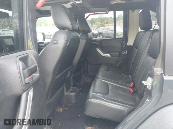 2016 Jeep Wrangler Unlimited Rubicon with VIN 1C4HJWFG6GL346862, listed as a IAAI auction lot 42441610 with 94,227 mi miles and . Bid and sale history available at DreamBid. Image 8.