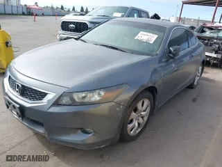 2008 Honda Accord Cpe EX-L with VIN 1HGCS22858A009161, listed as a IAAI auction lot 41499715 with 196,308 mi miles. Bid and sale history available at carsss.com. Image 2.