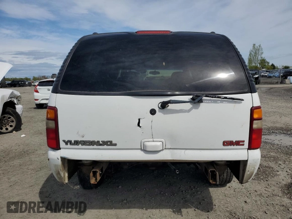 2002 GMC Yukon XL SLT z VIN 3GKFK16Z52G304086, wystawiony jako Copart lot #52407905 z przebiegiem Nie podano mil oraz Szkody całkowita. Historia ofert i sprzedaży dostępna na DreamBid. Obrazek 6.