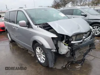 2019 Dodge Grand Caravan SXT with VIN 2C4RDGCG2KR802829, listed as a IAAI auction lot 41348556 with 144,289 mi miles. Bid and sale history available at carsss.com. Image 1.