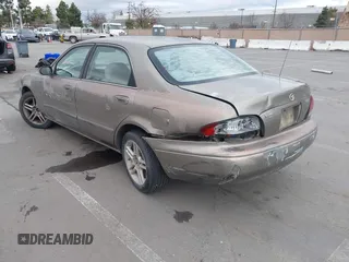 1999 Mazda 626 ES with VIN 1YVGF22C8X5900510, listed as a IAAI auction lot 41479213 with 178,182 mi miles. Bid and sale history available at carsss.com. Image 6.