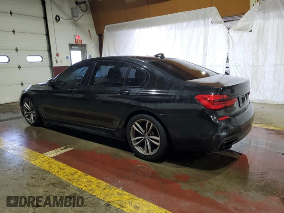 2019 BMW 7 Series 740i xDrive with VIN WBA7E4C50KGV28708, listed as a Copart auction lot 55141895 with 130,925 mi miles and Clean title. Bid and sale history available at DreamBid. Image 2.