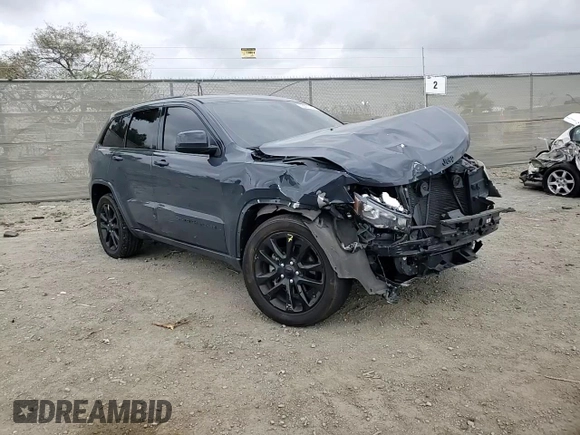 2018 Jeep Grand Cherokee Altitude z VIN 1C4RJEAG7JC392004, wystawiony jako Copart lot #53387525 z przebiegiem 103 406 mil mil oraz Szkoda całkowita • Salvage title. Historia ofert i sprzedaży dostępna na DreamBid. Obrazek 11.