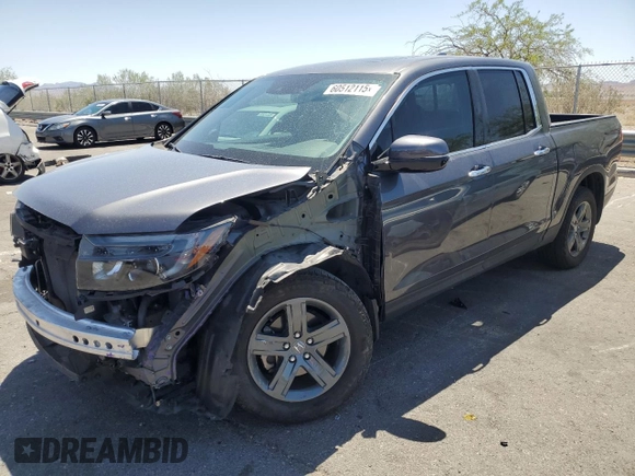 2022 Honda Ridgeline RTL-E with VIN 5FPYK3F73NB039135, listed as a Copart auction lot 60512115 with 27,348 mi miles and Salvage title. Bid and sale history available at DreamBid. Image 1.