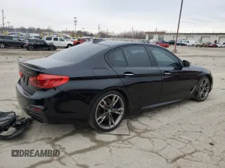 2018 BMW 5 Series M550i xDrive with VIN WBAJB9C56JB049524, listed as a Copart auction lot 43511805 with 55,759 mi miles and Salvage title. Bid and sale history available at DreamBid. Image 3.