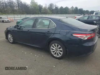 2018 Toyota Camry LE с VIN 4T1B11HK7JU643274, выставлен на аукционе Copart как лот 57064245 с пробегом 162 857 миль миль и Чистый • Clean title. История ставок и продаж доступна на DreamBid. Изображение 2.