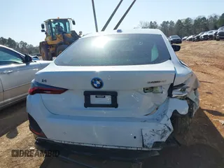 2023 BMW i4 eDrive40 z VIN WBY73AW08PFN72118, wystawiony jako IAAI lot #41849570 z przebiegiem 27 118 mil mil oraz . Historia ofert i sprzedaży dostępna na DreamBid. Obrazek 17.