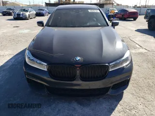2019 BMW 7 Series 750i with VIN WBA7F0C56KGM25430, listed as a Copart auction lot 42048135 with 74,717 mi miles and Salvage title. Bid and sale history available at DreamBid. Image 5.