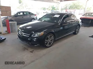 2016 Mercedes-Benz C 300 with VIN 55SWF4JBXGU174572, listed as a IAAI auction lot 42309066 with 71,198 mi miles and . Bid and sale history available at DreamBid. Image 18.