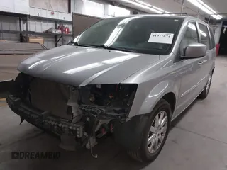 2013 Chrysler Town & Country Touring with VIN 2C4RC1BG7DR730420, listed as a IAAI auction lot 41911674 with 179,810 mi miles and . Bid and sale history available at DreamBid. Image 2.