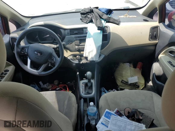 2013 Kia Rio LX with VIN KNADM4A30D6307304, listed as a Copart auction lot 66700254 with Not Provided miles and Salvage Title. Bid and sale history available at DreamBid. Image 8.