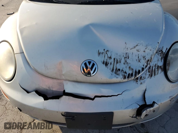 2009 Volkswagen Beetle Blush with VIN 3VWSG31Y49M411919, listed as a Copart auction lot 77814874 with 131,399 mi miles and Salvage title. Bid and sale history available at DreamBid. Image 12.