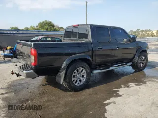 2000 Nissan Frontier XE with VIN 1N6ED27T7YC300373, listed as a Copart auction lot 55829535 with 301,305 mi miles and Salvage title. Bid and sale history available at DreamBid. Image 3.