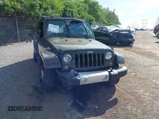 2015 Jeep Wrangler Unlimited Altitude z VIN 1C4HJWEG0FL752152, wystawiony jako IAAI lot #42311043 z przebiegiem 112 379 mil mil oraz . Historia ofert i sprzedaży dostępna na DreamBid. Obrazek 18.