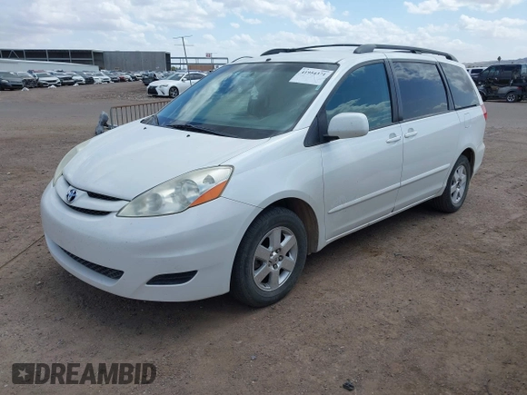 2009 Toyota Sienna XLE with VIN 5TDZK22C59S266936, listed as a IAAI auction lot 41954371 with 272,039 mi miles and . Bid and sale history available at carsss.com. Image 2.