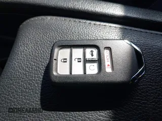 2019 Honda Civic Sport with VIN 2HGFC2F8XKH598141, listed as a IAAI auction lot 42013724 with 98,401 mi miles and . Bid and sale history available at DreamBid. Image 11.