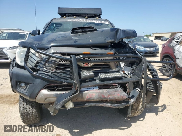 2014 Toyota Tacoma PreRunner with VIN 5TFJX4GN5EX036824, listed as a Copart auction lot 53106185 with 166,843 mi miles and Salvage title. Bid and sale history available at DreamBid. Image 5.