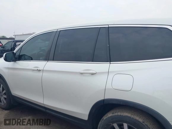 2019 Honda Pilot EX-L with VIN 5FNYF6H52KB025930, listed as a IAAI auction lot 42117673 with 84,721 mi miles and . Bid and sale history available at DreamBid. Image 14.