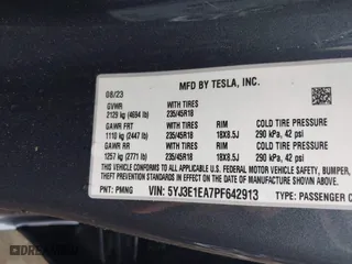 2023 Tesla Model 3 with VIN 5YJ3E1EA7PF642913, listed as a IAAI auction lot 41898249 with 26,394 mi miles. Bid and sale history available at carsss.com. Image 9.