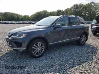 2016 Volkswagen Touareg Sport with VIN WVGEP9BP6GD005332, listed as a Copart auction lot 60041705 with 55,716 mi miles and Salvage title. Bid and sale history available at DreamBid. Image 1.