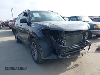 2021 Volkswagen Atlas SE z VIN 1V2HR2CA0MC543876, wystawiony jako IAAI lot #41598298 z przebiegiem 99 171 mil mil oraz . Historia ofert i sprzedaży dostępna na DreamBid. Obrazek 1.