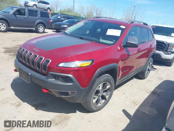 2016 Jeep Cherokee Trailhawk with VIN 1C4PJMBS9GW237059, listed as a IAAI auction lot 42079788 with 114,513 mi miles. Bid and sale history available at carsss.com. Image 18.