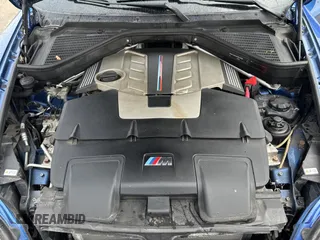 2013 BMW X6 M with VIN 5YMGZ0C57DLL29849, listed as a Copart auction lot 53517205 with 117,400 mi miles and Clean Title. Bid and sale history available at carsss.com. Image 7.