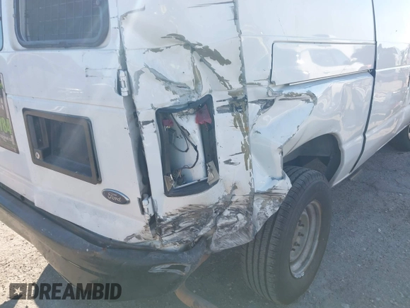 2008 Ford Econoline Cargo Commercial with VIN 1FTNE24W58DA25286, listed as a IAAI auction lot 41443439 with 316,959 mi miles and . Bid and sale history available at carsss.com. Image 14.