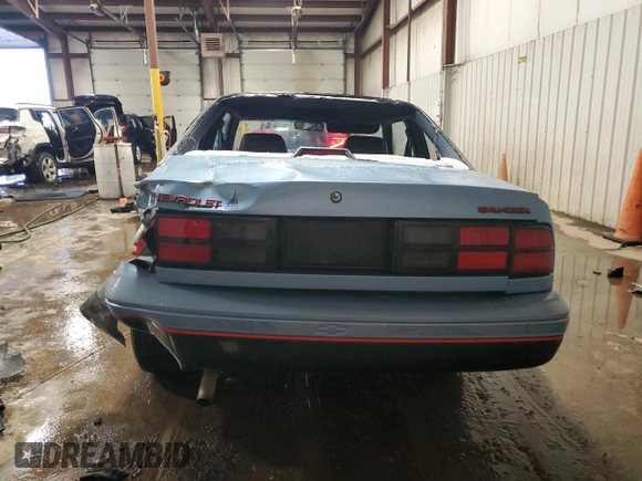 1989 Chevrolet Cavalier with VIN 1G1JC1113KJ278292, listed as a Copart auction lot 44942375 with 85,604 mi miles and Salvage Title. Bid and sale history available at DreamBid. Image 6.