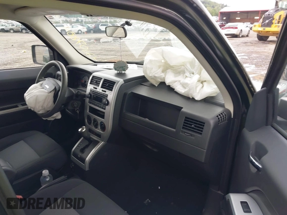 2008 Jeep Patriot Sport with VIN 1J8FT28088D520705, listed as a IAAI auction lot 42107804 with 77,032 mi miles and . Bid and sale history available at DreamBid. Image 5.