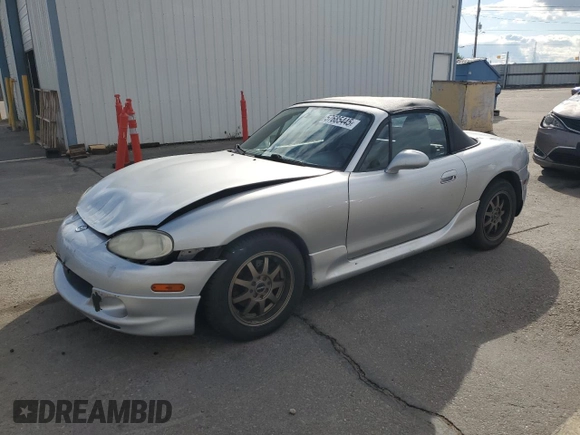2003 Mazda MX-5 Miata Cloth z VIN JM1NB353X30311086, wystawiony jako Copart lot #57685445 z przebiegiem 141 634 mil mil oraz Szkoda całkowita • Salvage title. Historia ofert i sprzedaży dostępna na DreamBid. Obrazek 1.