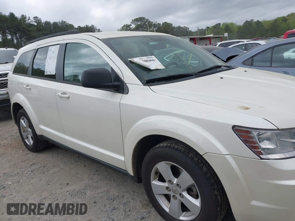 2014 Dodge Journey SE with VIN 3C4PDCABXET135338, listed as a IAAI auction lot 41950088 with 209,944 mi miles. Bid and sale history available at carsss.com. Image 13.
