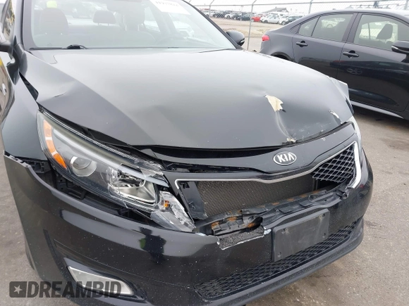 2015 Kia Optima LX with VIN 5XXGM4A7XFG388562, listed as a IAAI auction lot 41937822 with 136,764 mi miles. Bid and sale history available at carsss.com. Image 6.