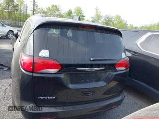 2021 Chrysler Voyager LXI with VIN 2C4RC1DG0MR506659, listed as a IAAI auction lot 42130000 with 121,350 mi miles. Bid and sale history available at carsss.com. Image 16.