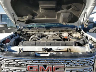 2021 GMC Sierra 3500HD Denali z VIN 1GT49WEYXMF156221, wystawiony jako Copart lot #81958804 z przebiegiem 60 986 mil mil oraz Nie do naprawy. Historia ofert i sprzedaży dostępna na DreamBid. Obrazek 11.