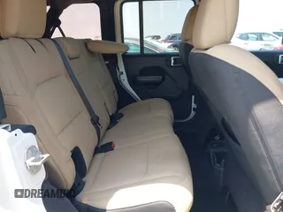 2019 Jeep Wrangler Unlimited Sport S with VIN 1C4HJXDN2KW508341, listed as a IAAI auction lot 42286619 with 49,410 mi miles and . Bid and sale history available at DreamBid. Image 8.