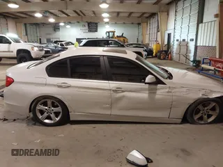 2014 BMW 3 Series 328d with VIN WBA3D3C57EK156586, listed as a IAAI auction lot 41328159 with 233,080 mi miles and . Bid and sale history available at DreamBid. Image 13.