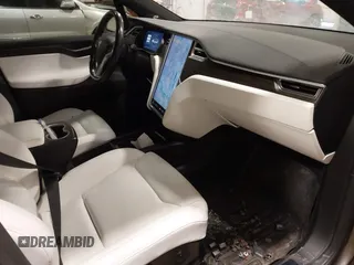 2016 Tesla Model X 70D with VIN 5YJXCBE27GF004974, listed as a IAAI auction lot 41630556 with 167,709 mi miles. Bid and sale history available at carsss.com. Image 5.