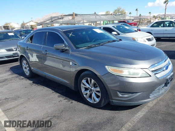 2011 Ford Taurus SEL with VIN 1FAHP2EW9BG158991, listed as a IAAI auction lot 41530132 with 153,323 mi miles. Bid and sale history available at carsss.com. Image 1.