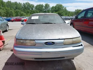 1993 Ford Taurus with VIN 1FACP52U8PA140927, listed as a IAAI auction lot 42189786 with 56,327 mi miles and . Bid and sale history available at DreamBid. Image 6.