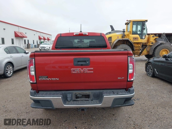 2015 GMC Canyon 2WD SLT with VIN 1GTG5CE3XF1211164, listed as a IAAI auction lot 41490387 with 163,932 mi miles. Bid and sale history available at carsss.com. Image 16.