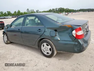 2003 Toyota Camry LE z VIN 4T1BF32K13U554339, wystawiony jako Copart lot #55972595 z przebiegiem 69 549 mil mil oraz Szkoda całkowita • Salvage title. Historia ofert i sprzedaży dostępna na DreamBid. Obrazek 2.