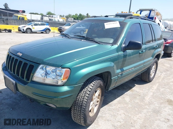 1999 Jeep Grand Cherokee Limited with VIN 1J4GW68N5XC666564, listed as a IAAI auction lot 42117018 with 177,440 mi miles. Bid and sale history available at carsss.com. Image 2.
