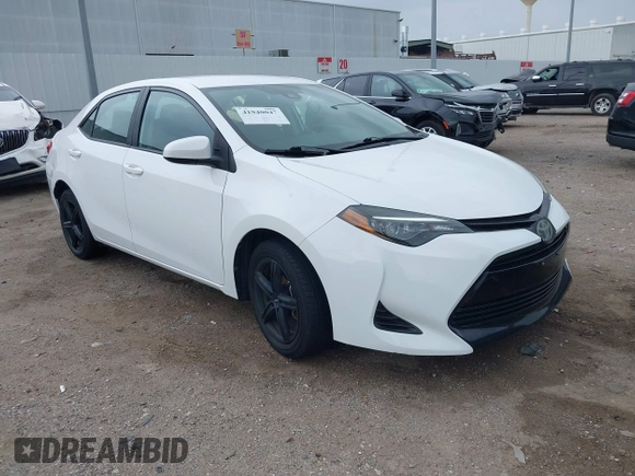 2019 Toyota Corolla L with VIN 5YFBURHE1KP930676, listed as a IAAI auction lot 41940047 with 82,885 mi miles. Bid and sale history available at carsss.com. Image 1.