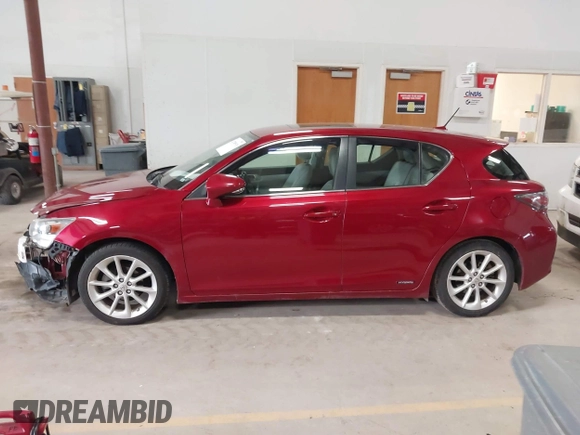 2011 Lexus CT 200h z VIN JTHKD5BH6B2042420, wystawiony jako IAAI lot #41700918 z przebiegiem 131 348 mil mil oraz . Historia ofert i sprzedaży dostępna na DreamBid. Obrazek 14.