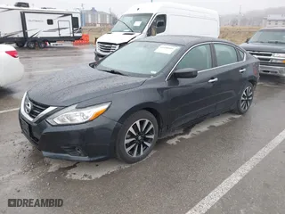 2018 Nissan Altima 2.5 SR with VIN 1N4AL3AP3JC165989, listed as a IAAI auction lot 41490589 with 84,879 mi miles. Bid and sale history available at carsss.com. Image 18.
