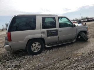 1999 GMC Denali with VIN 1GKEK13R0XR915053, listed as a Copart auction lot 49241145 with 2,664,121 mi miles and Salvage Title. Bid and sale history available at carsss.com. Image 3.