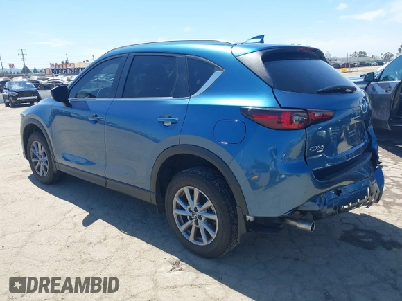 2023 Mazda CX-5 S Select with VIN JM3KFBBM3P0208376, listed as a IAAI auction lot 42023207 with 20,114 mi miles and . Bid and sale history available at carsss.com. Image 3.