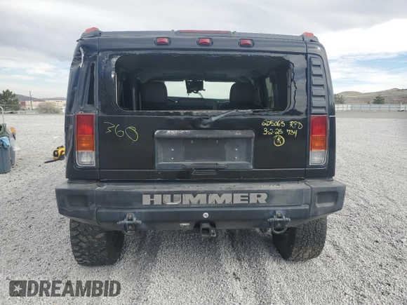 2004 Hummer H2 z VIN 5GRGN23U74H100175, wystawiony jako Copart lot #52642125 z przebiegiem 112 305 mil mil oraz Szkoda całkowita • Salvage title. Historia ofert i sprzedaży dostępna na DreamBid. Obrazek 6.